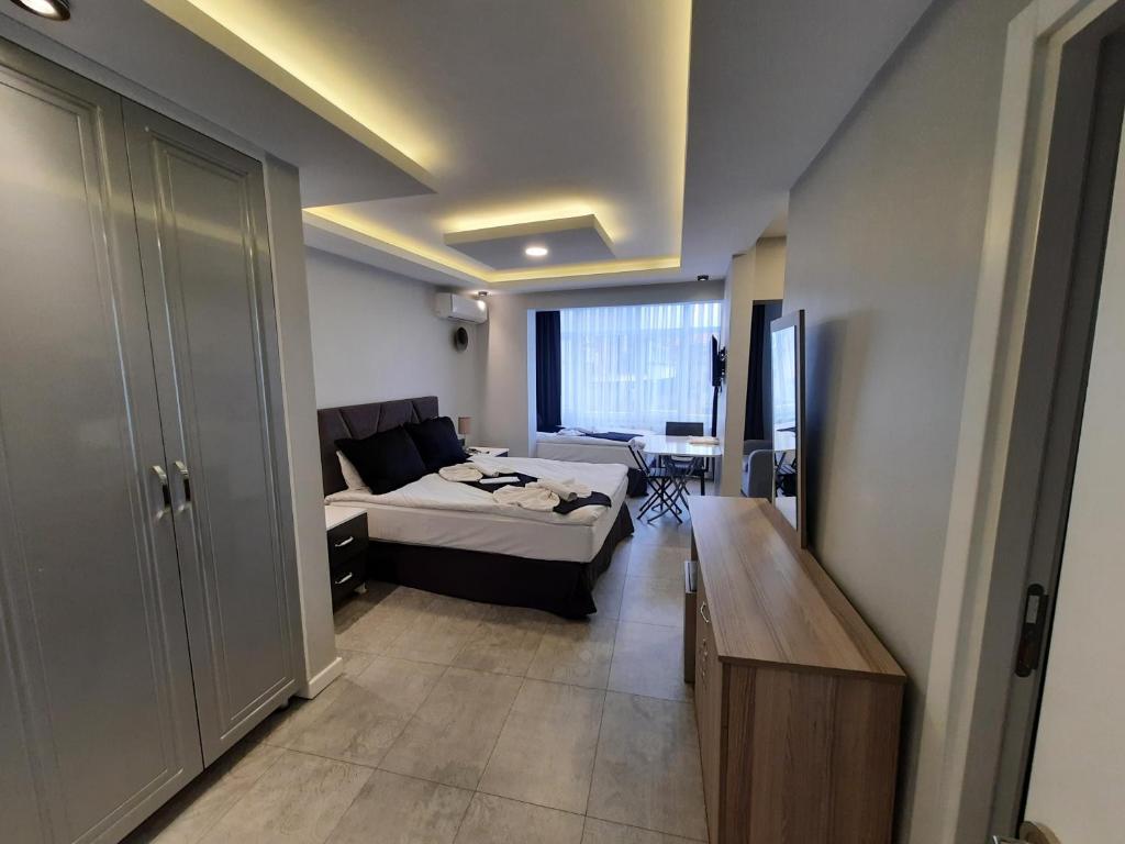 Lüks Üç Kişilik Oda - Görsel 5
